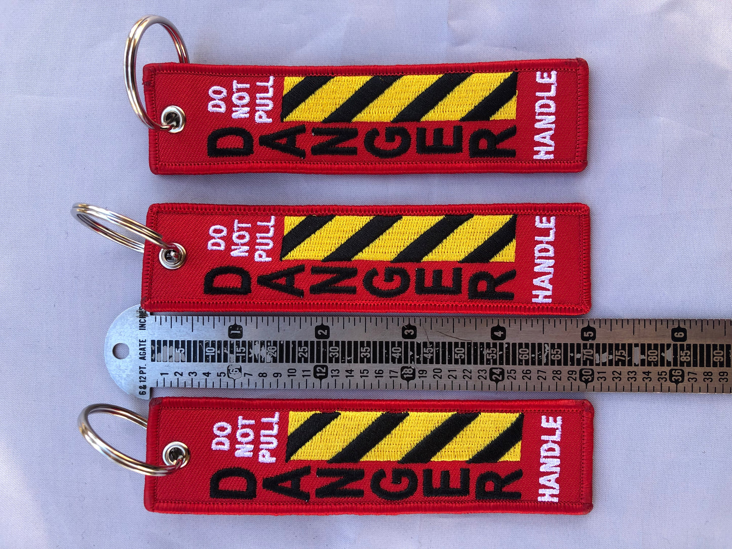 Do Not Pull Handle Danger Keychain Set Of 3