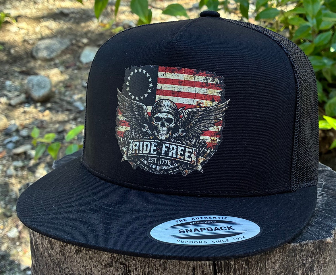 Ride Free flat bill hat — actual product photo, front three-quarter view